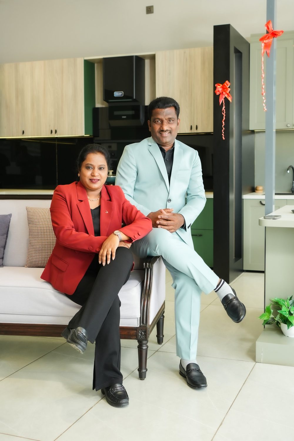 Founders Apsana Shaikh and Sameer Shaikh seated in the AS9 Interiors showroom