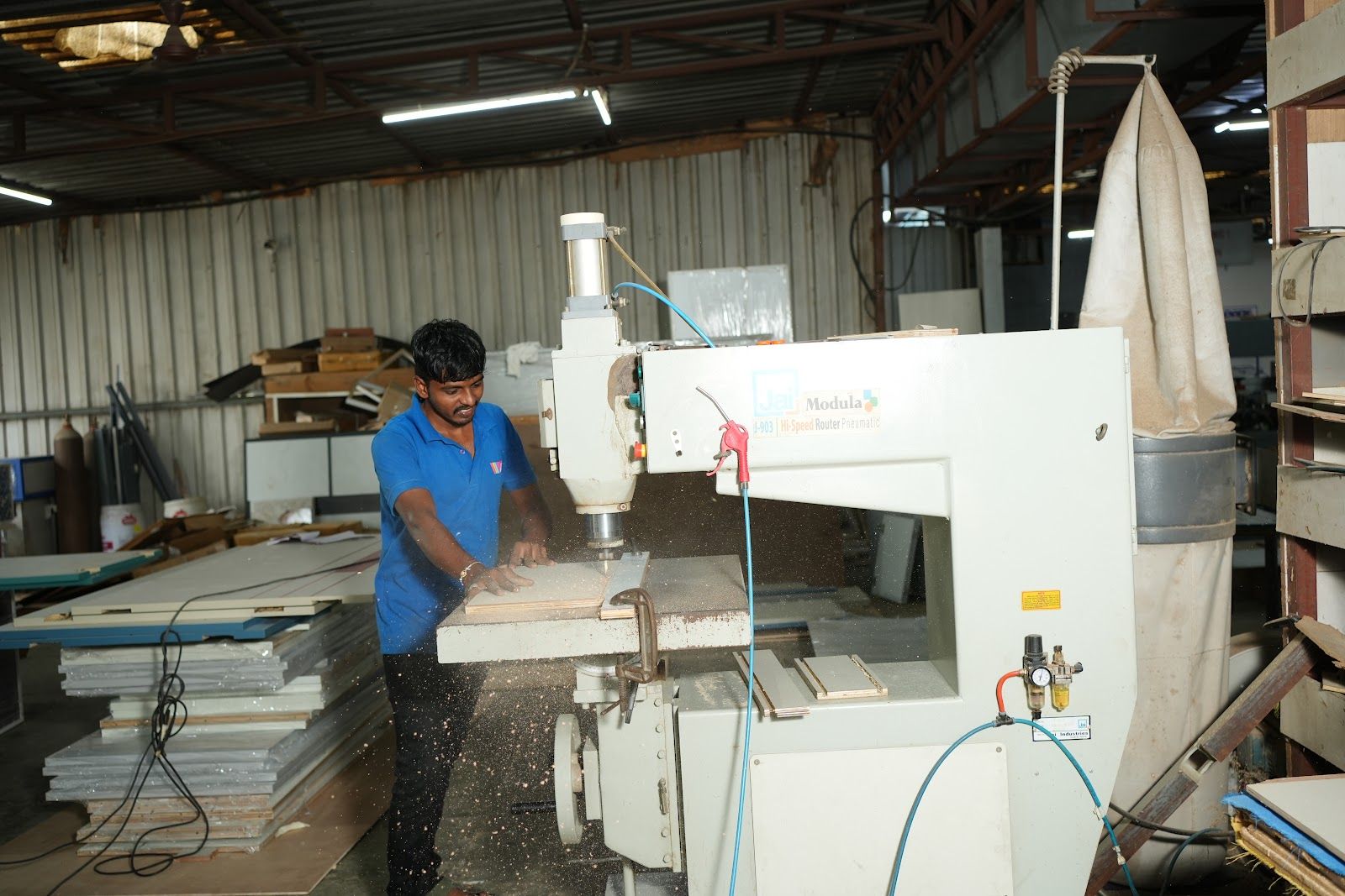 Routing machine shaping a panel at the AS9 factory