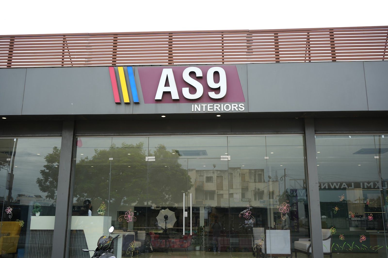 AS9 Interiors showroom building with the AS9 logo on the front