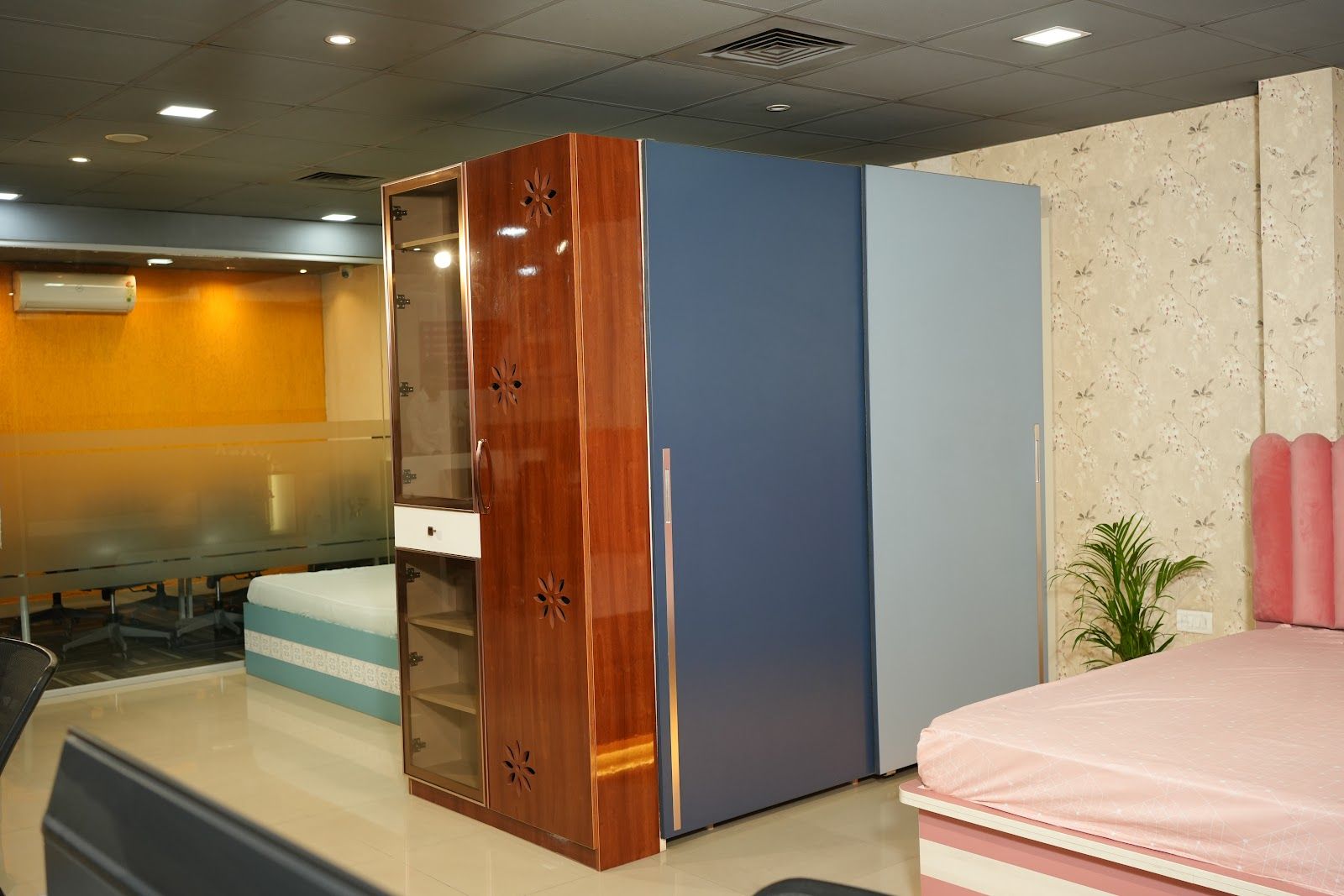 High-gloss wardrobe in walnut and blue on display
