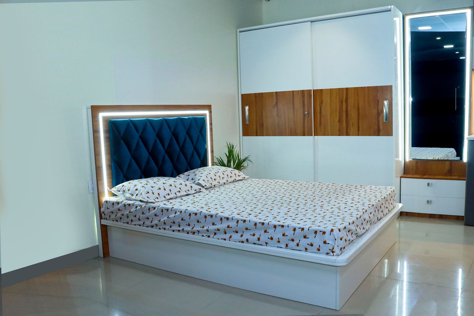 Bedroom set with an upholstered LED-lit headboard, storage bed and sliding wardrobe